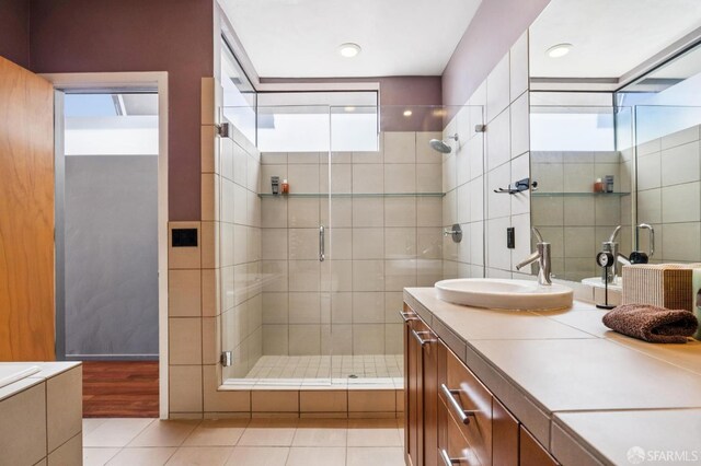 6353 Skyline Blvd, Oakland, CA 94611 - bathroom with vanity, a shower stall, and tile patterned floors