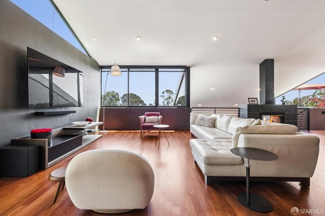6353 Skyline Blvd, Oakland, CA 94611 - living room featuring wood finished floors, plenty of natural light, and lofted ceiling