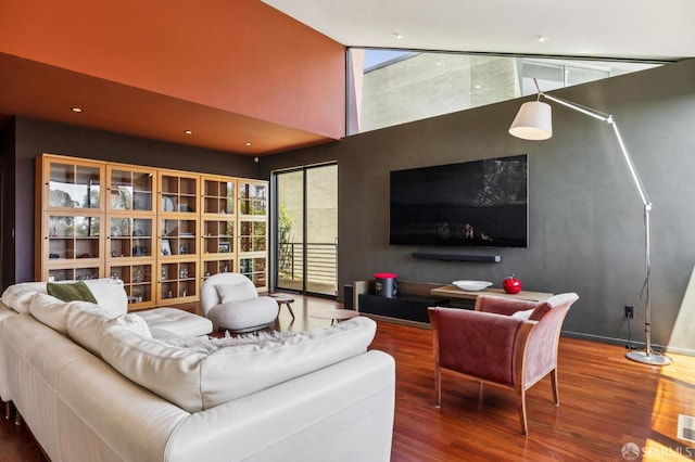 6353 Skyline Blvd, Oakland, CA 94611 - living area featuring wood finished floors, a towering ceiling, and recessed lighting