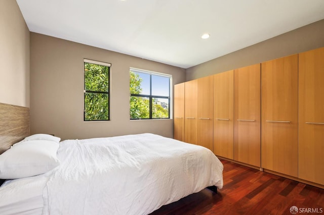 6353 Skyline Blvd, Oakland, CA 94611 - bedroom with dark wood-style floors and recessed lighting