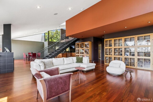 6353 Skyline Blvd, Oakland, CA 94611 - living area featuring recessed lighting, wood finished floors, stairway, and a high ceiling