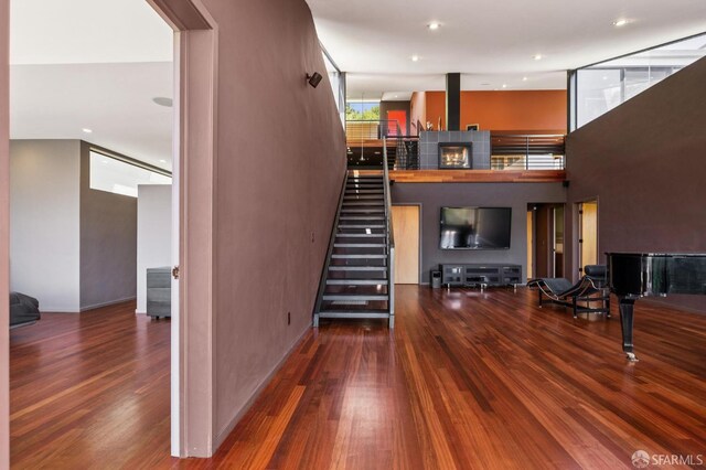 6353 Skyline Blvd, Oakland, CA 94611 - living area featuring wood finished floors, stairway, recessed lighting, and baseboards