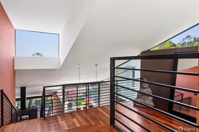 6353 Skyline Blvd, Oakland, CA 94611 - stairs with wood finished floors and a high ceiling
