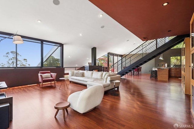 6353 Skyline Blvd, Oakland, CA 94611 - living room with stairs, wood finished floors, and recessed lighting