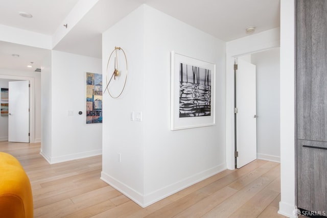 201 Folsom St Unit 38E, San Francisco, CA 94105 - hallway with light wood-style flooring and baseboards