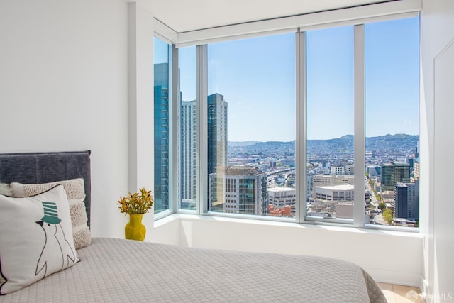 201 Folsom St Unit 38E, San Francisco, CA 94105 - bedroom with a view of city and a mountain view