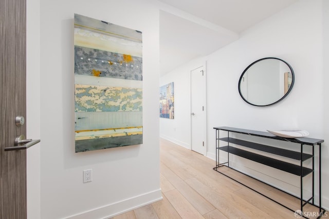 201 Folsom St Unit 38E, San Francisco, CA 94105 - corridor featuring wood finished floors and baseboards