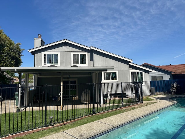 6517 Filaree Way, Sacramento, CA 95842 - back of property with a chimney
