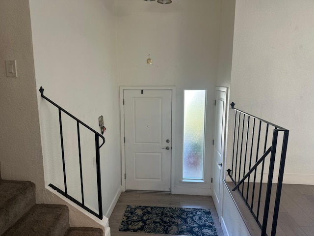 6517 Filaree Way, Sacramento, CA 95842 - foyer with stairway, wood finished floors, and baseboards
