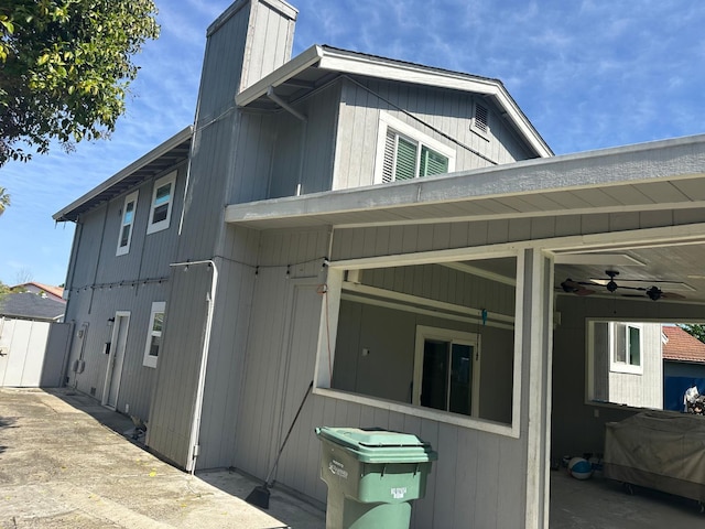 6517 Filaree Way, Sacramento, CA 95842 - view of side of home featuring a chimney