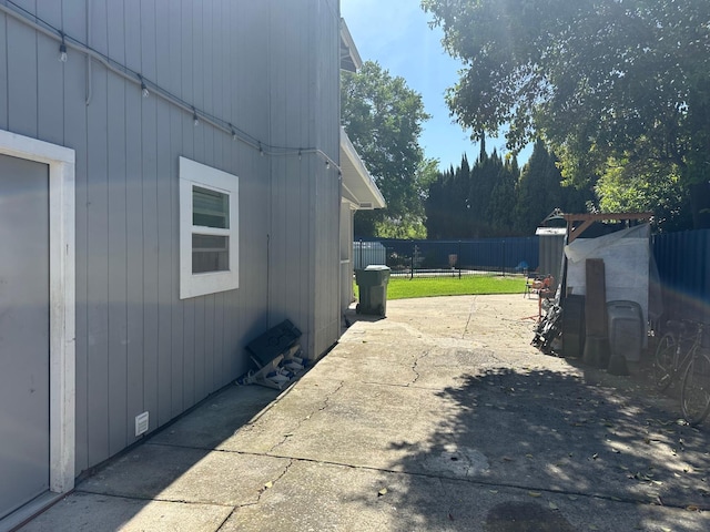 6517 Filaree Way, Sacramento, CA 95842 - view of side of property with a patio area