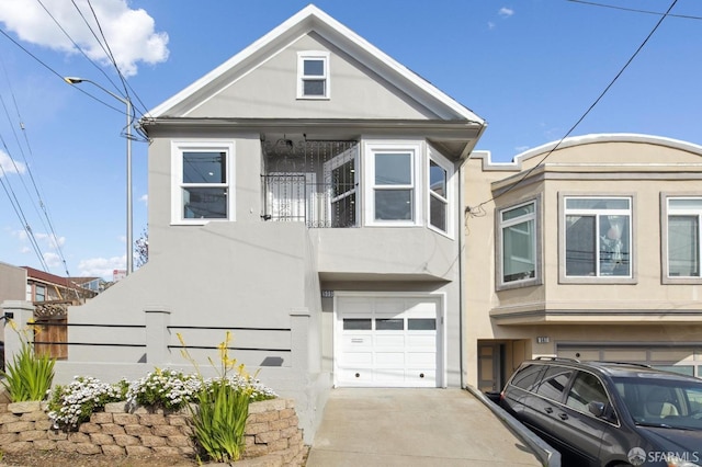 view of front of home with a garage