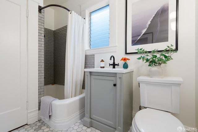 full bathroom with tile patterned floors, shower / bath combination with curtain, toilet, and vanity