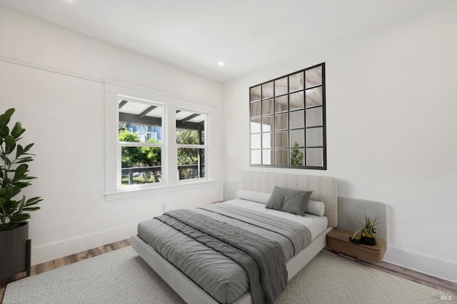 bedroom featuring hardwood / wood-style flooring