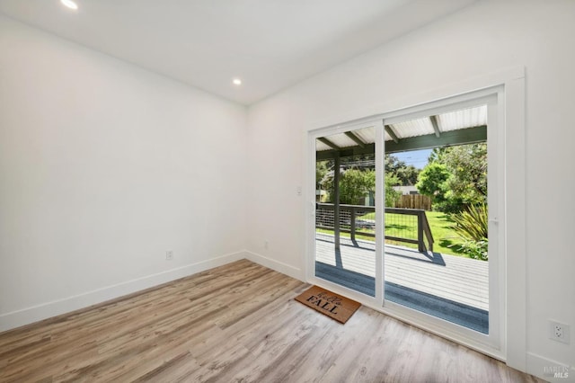 unfurnished room featuring light hardwood / wood-style floors