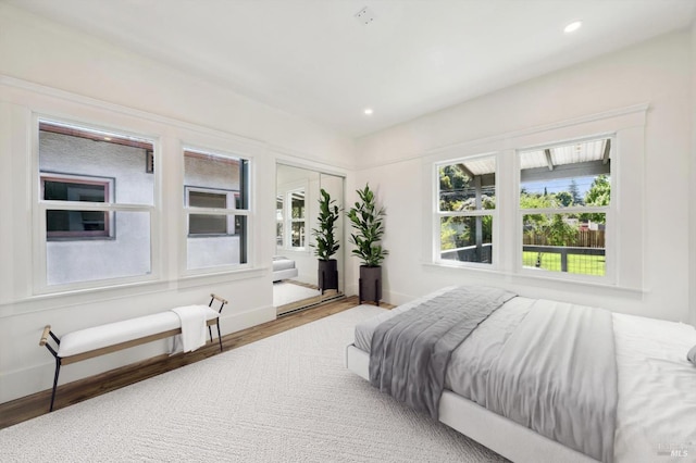 bedroom featuring light wood-type flooring