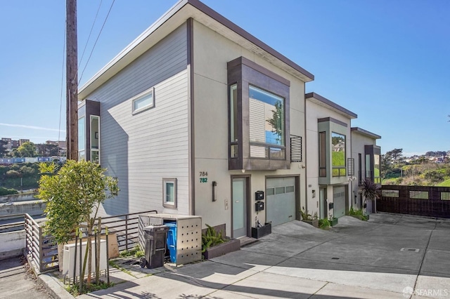 view of side of property featuring a garage