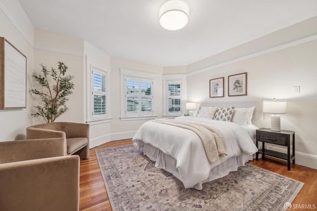 bedroom featuring hardwood / wood-style flooring