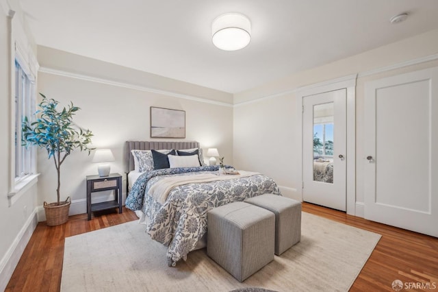 bedroom with wood-type flooring