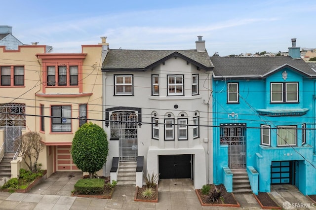 view of property with a garage