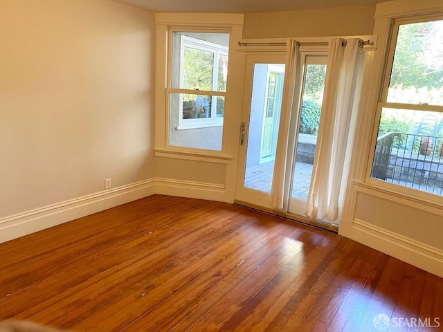 doorway to outside featuring hardwood / wood-style flooring