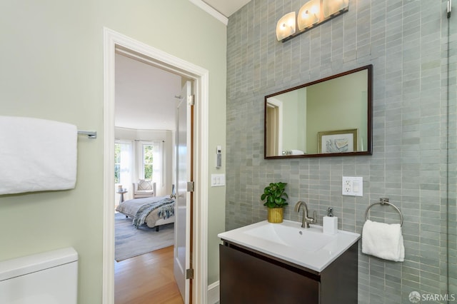3544 Webster St, San Francisco, CA 94123 - bathroom with vanity, tile walls, wood finished floors, and ensuite bathroom