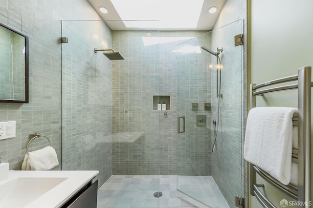 3544 Webster St, San Francisco, CA 94123 - full bath featuring vanity, a stall shower, recessed lighting, and a skylight