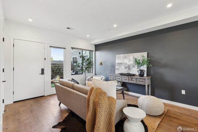 living room featuring light wood-type flooring