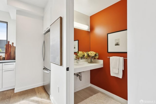 bathroom featuring hardwood / wood-style floors