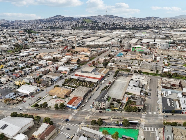 drone / aerial view featuring a mountain view