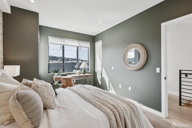 bedroom featuring light hardwood / wood-style floors