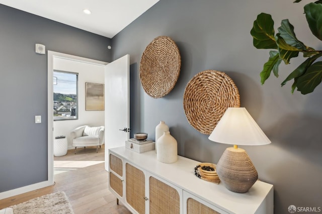 hallway featuring light hardwood / wood-style flooring