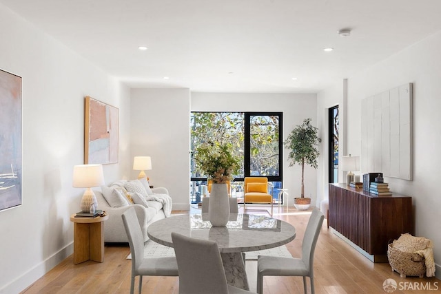 dining room featuring light hardwood / wood-style floors