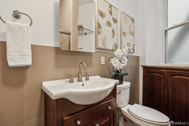 735 Geary St Unit 102, San Francisco, CA 94109 - bathroom featuring vanity, tile walls, and toilet