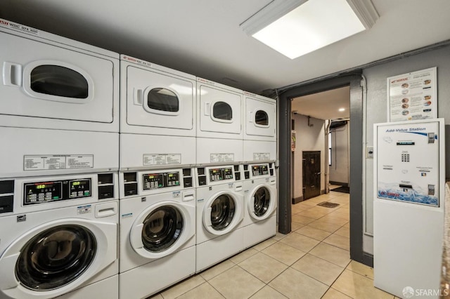 735 Geary St Unit 102, San Francisco, CA 94109 - shared laundry featuring estacked washer and dryer, washer and clothes dryer, and light tile patterned floors