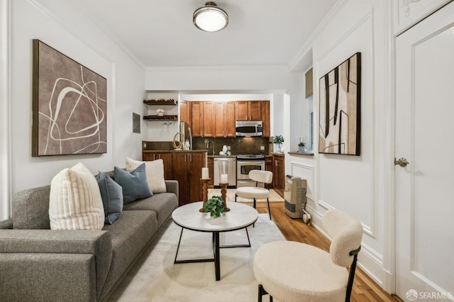 735 Geary St Unit 102, San Francisco, CA 94109 - living room featuring light wood-style flooring and ornamental molding