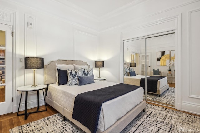 735 Geary St Unit 102, San Francisco, CA 94109 - bedroom with wood finished floors, a closet, and crown molding