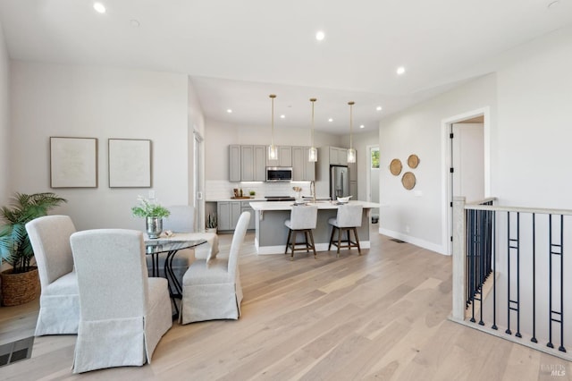 745 Redwood Rd, San Anselmo, CA 94960 - dining area with light wood-style floors, recessed lighting, and baseboards
