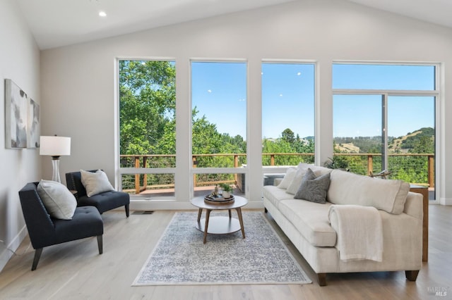 745 Redwood Rd, San Anselmo, CA 94960 - living room with lofted ceiling, light wood-style floors, and recessed lighting