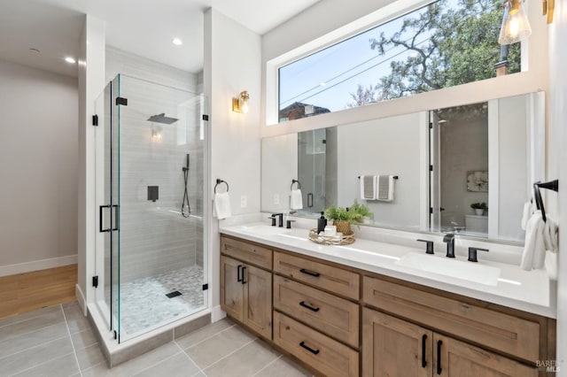 745 Redwood Rd, San Anselmo, CA 94960 - full bath with double vanity, a shower stall, tile patterned flooring, recessed lighting, and baseboards