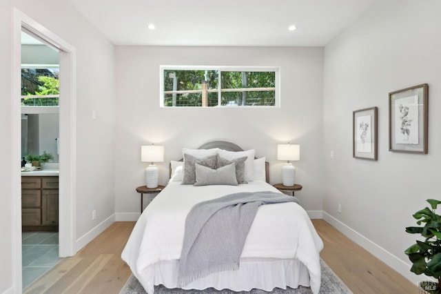 745 Redwood Rd, San Anselmo, CA 94960 - bedroom with light wood-type flooring, baseboards, ensuite bath, and recessed lighting
