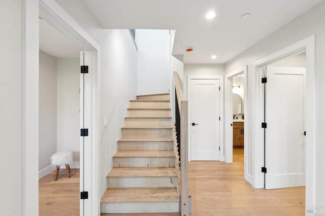 745 Redwood Rd, San Anselmo, CA 94960 - staircase with wood finished floors, recessed lighting, and baseboards