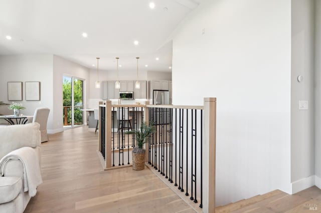 745 Redwood Rd, San Anselmo, CA 94960 - hallway featuring light wood-style floors, recessed lighting, baseboards, and an upstairs landing