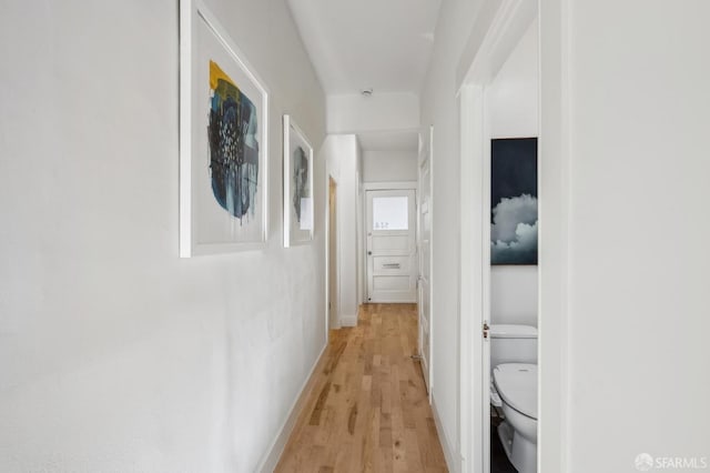 corridor featuring light hardwood / wood-style flooring