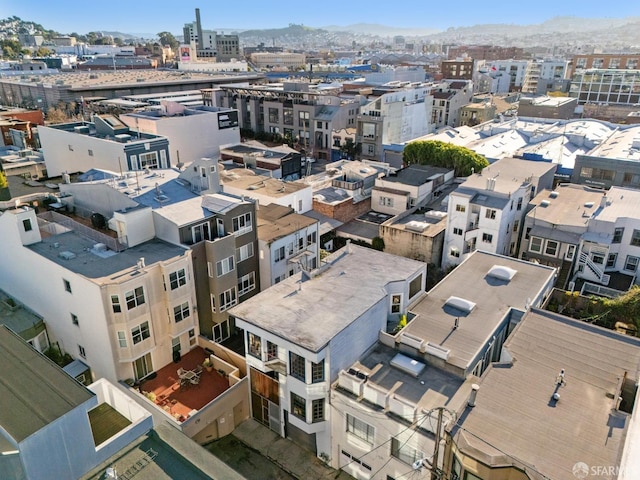 birds eye view of property featuring a mountain view