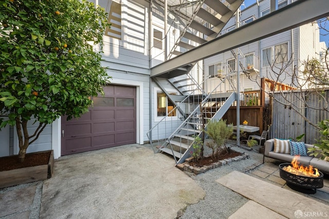 view of exterior entry featuring a patio area