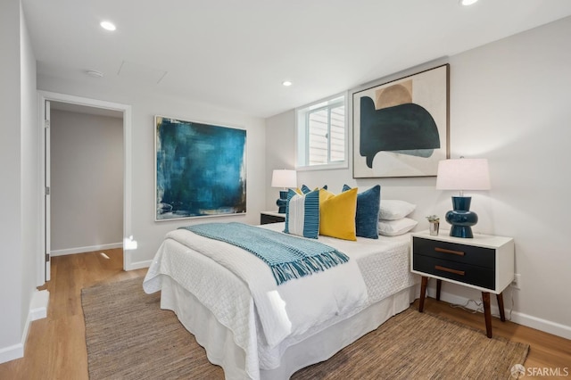 bedroom with wood-type flooring