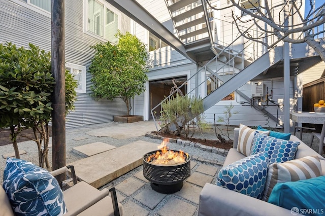 view of patio / terrace featuring a fire pit