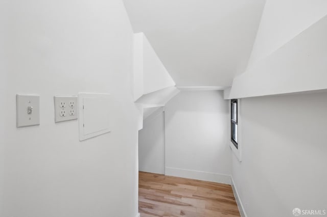 bonus room featuring light wood-type flooring