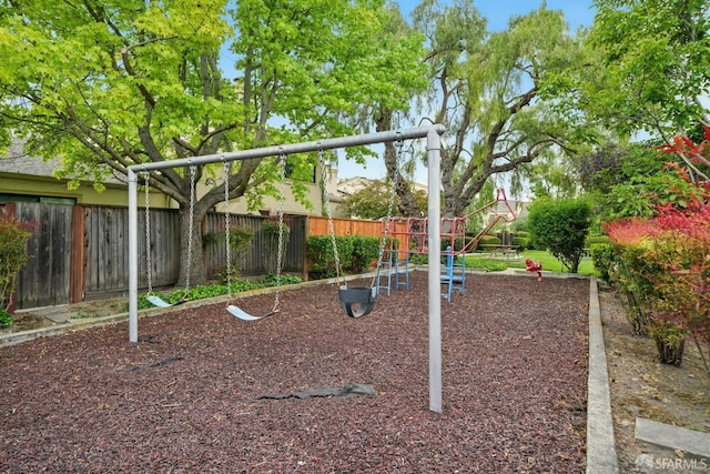 view of play area featuring fence